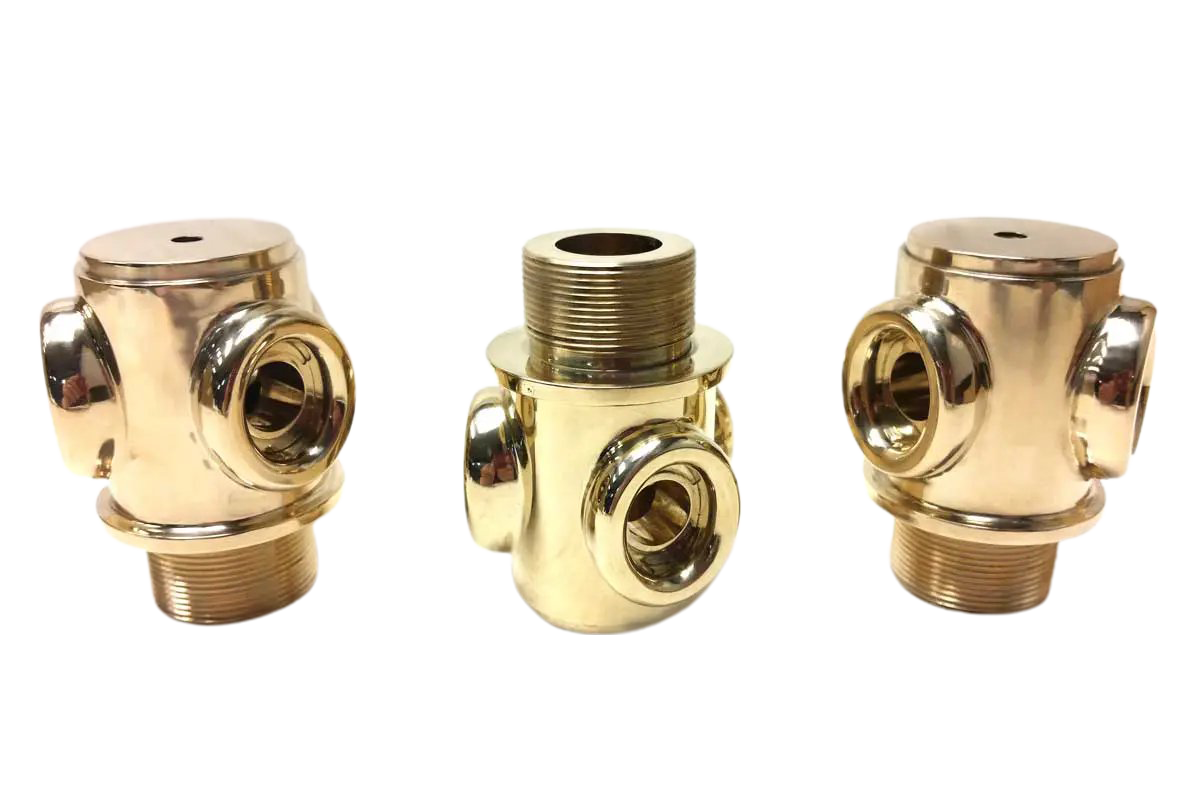 Three different views of a brass pipe fitting.